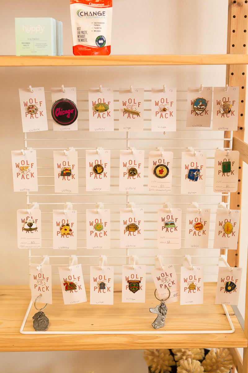 white earring/pin display