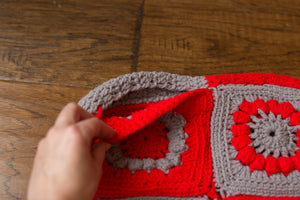 red & gray afghan pillow cover