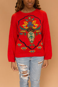 red abstract sweater