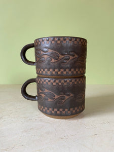 flame mug in lava rock