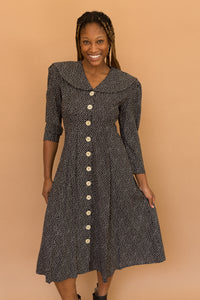 black spotted dress w/ big buttons