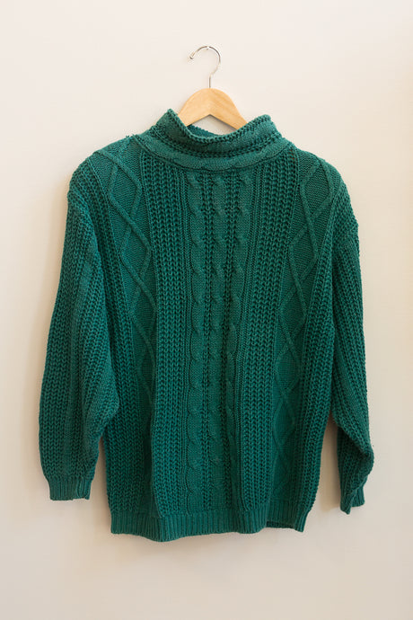 green turtleneck sweater
