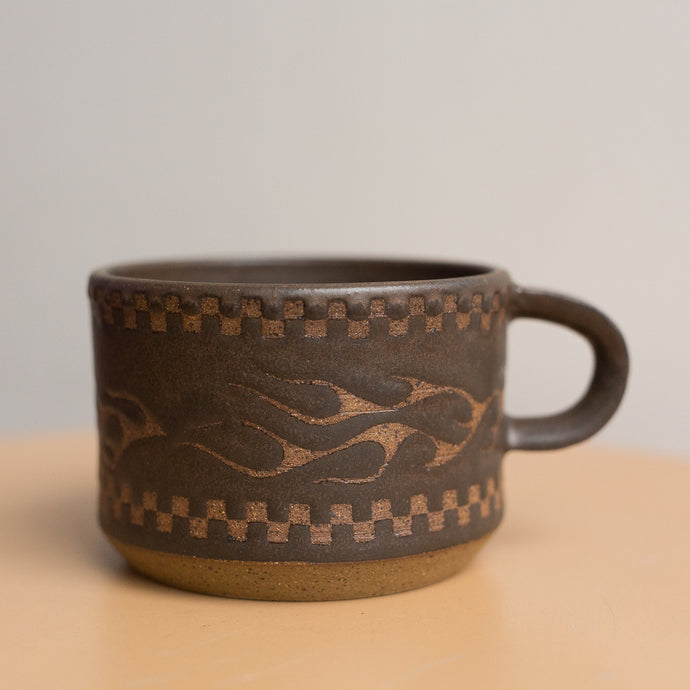 flame mug in lava rock