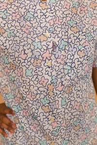 white pastel flower shirt