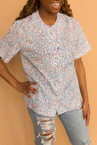white pastel flower shirt