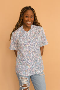 white pastel flower shirt