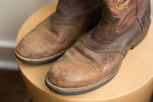 dark brown with blue & yellow stitching cowboy boots